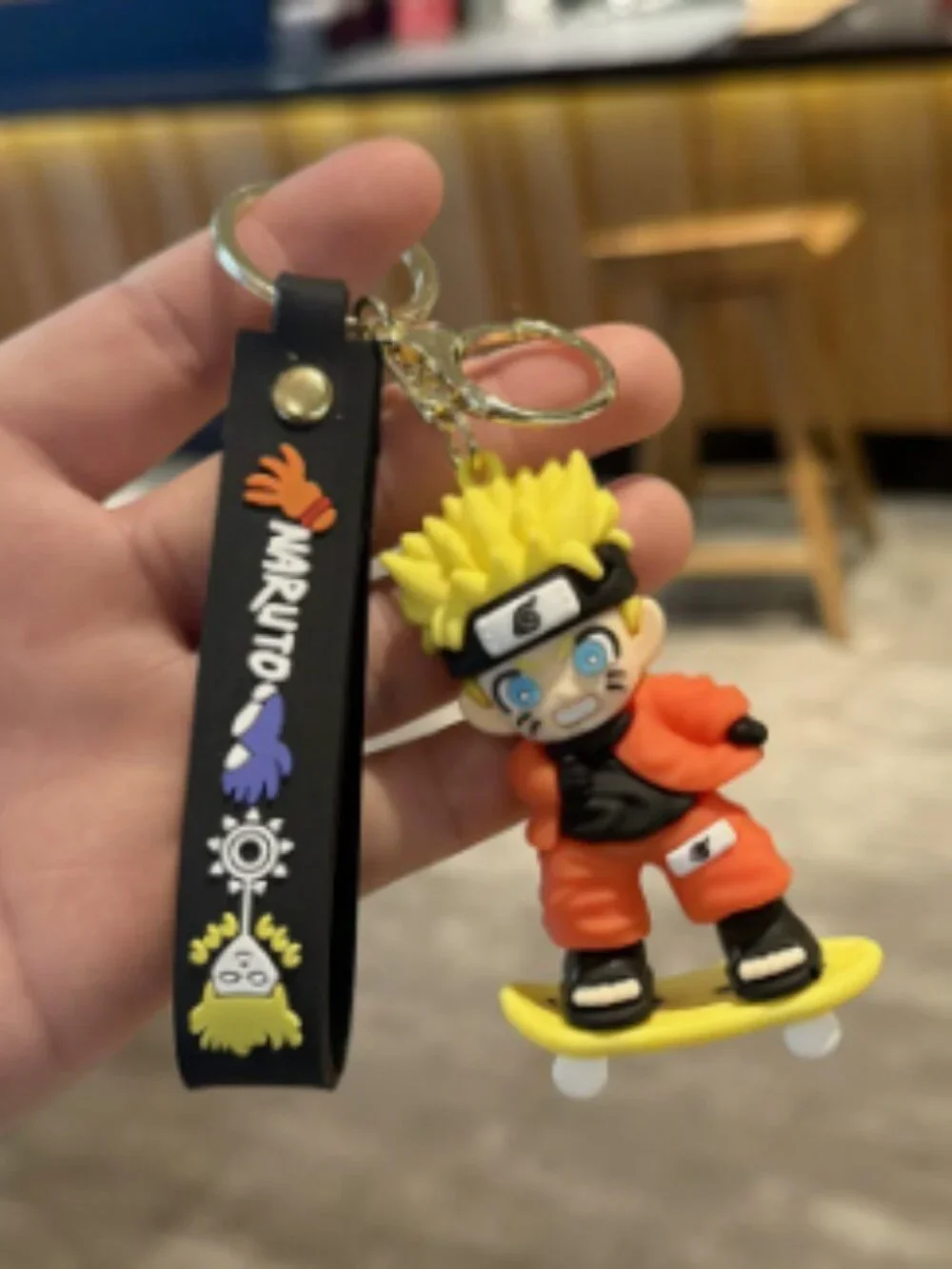 Anime Ninja Character Orange Outfit Skateboard Keychain Pendant Accessory